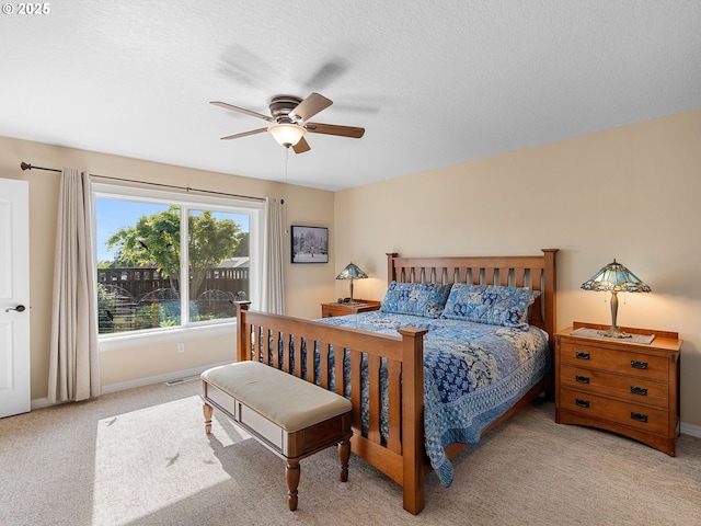 1478 SW 13th St, Dallas, OR 97338 - bedroom with carpet flooring, baseboards, a ceiling fan, and a textured ceiling