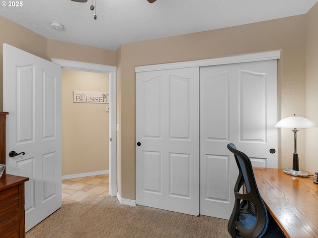 1478 SW 13th St, Dallas, OR 97338 - home office featuring light colored carpet, ceiling fan, baseboards, and a textured ceiling