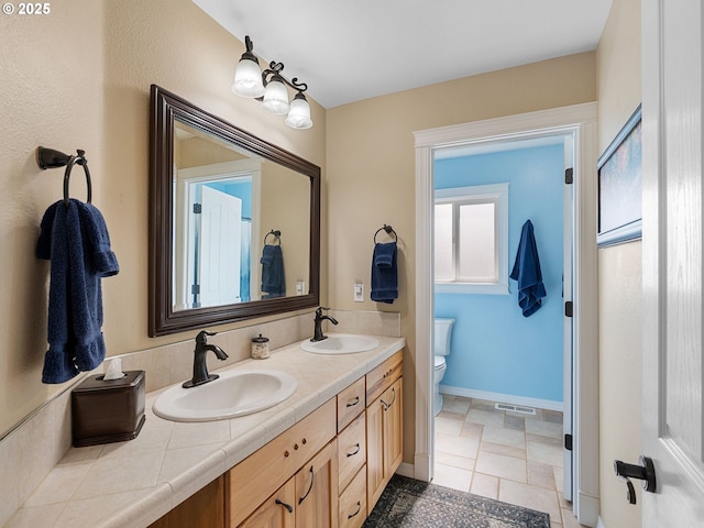1478 SW 13th St, Dallas, OR 97338 - bathroom featuring double vanity and toilet