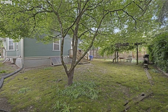 view of yard with fence