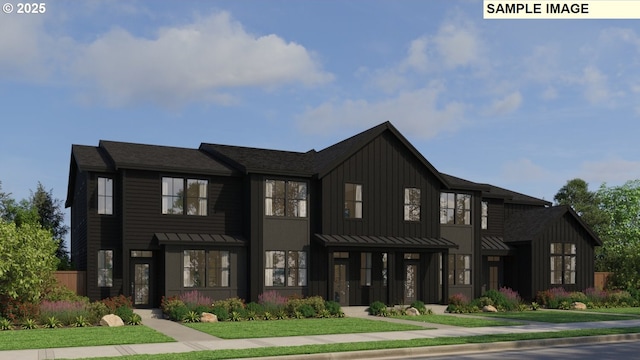 townhome / multi-family property featuring board and batten siding, a standing seam roof, and metal roof