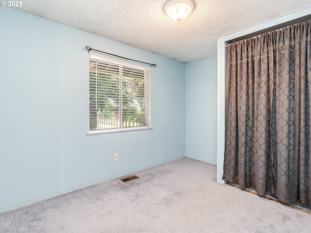 575 SE Centurion Ave, Gresham, OR 97080 - spare room featuring carpet flooring and a textured ceiling