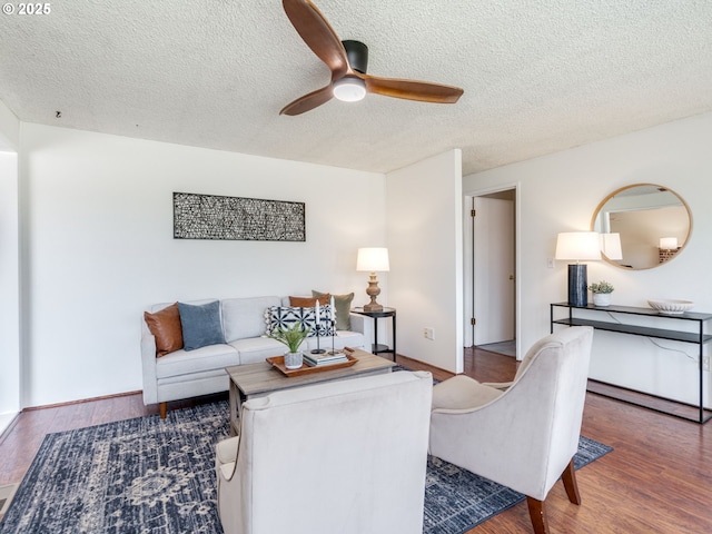 575 SE Centurion Ave, Gresham, OR 97080 - living area featuring ceiling fan, wood finished floors, and a textured ceiling
