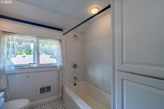 619 S 11th St, Coos Bay, OR 97420 - full bathroom with  shower combination, toilet, tile patterned flooring, and lofted ceiling