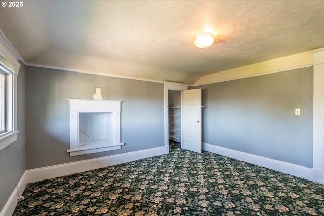 619 S 11th St, Coos Bay, OR 97420 - unfurnished bedroom featuring baseboards, lofted ceiling, carpet flooring, and crown molding