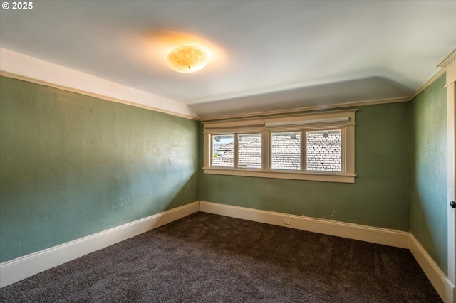 619 S 11th St, Coos Bay, OR 97420 - unfurnished room featuring dark carpet, baseboards, and lofted ceiling
