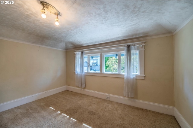 619 S 11th St, Coos Bay, OR 97420 - unfurnished room with carpet, crown molding, baseboards, and a textured ceiling
