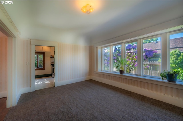 619 S 11th St, Coos Bay, OR 97420 - unfurnished room featuring carpet flooring, plenty of natural light, and baseboards
