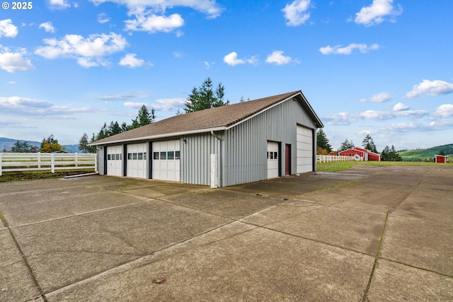 detached garage with fence