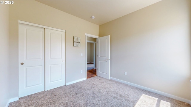 917 SE 9th Dr, Hermiston, OR 97838 - unfurnished bedroom featuring carpet, a closet, and baseboards