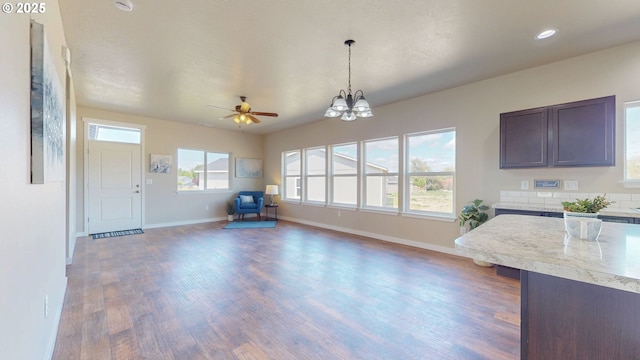 917 SE 9th Dr, Hermiston, OR 97838 - kitchen featuring light countertops, a chandelier, baseboards, wood finished floors, and recessed lighting