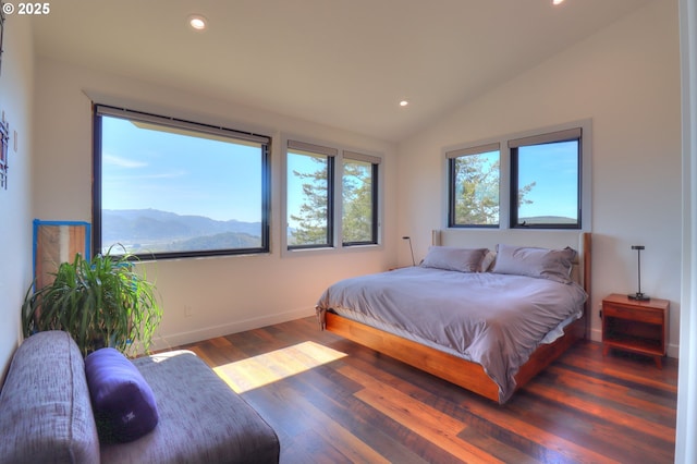 95660 Spirit Ridge Rd, Gold Beach, OR 97444 - bedroom with recessed lighting, vaulted ceiling, wood finished floors, baseboards, and a mountain view