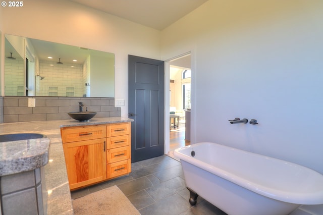 95660 Spirit Ridge Rd, Gold Beach, OR 97444 - bathroom with decorative backsplash, tiled shower, vanity, and a soaking tub