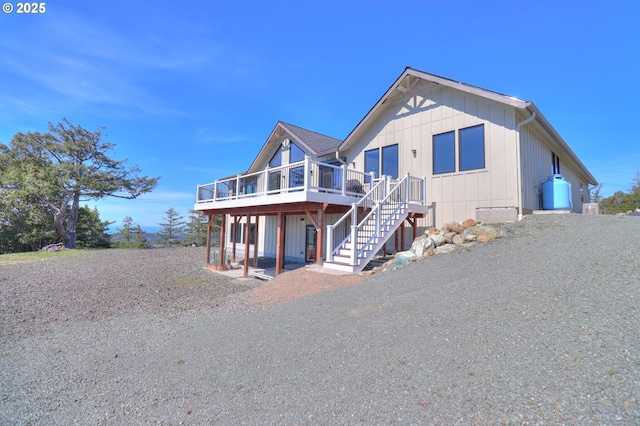 95660 Spirit Ridge Rd, Gold Beach, OR 97444 - view of front facade with a deck and stairs