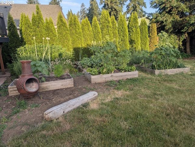 33874 NE Erin Dr, Scappoose, OR 97056 - view of grassy yard with a garden