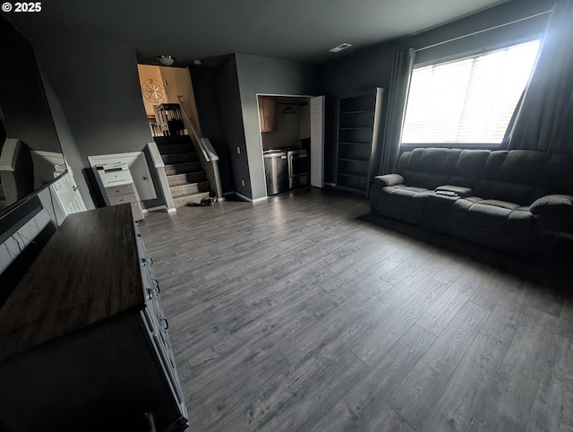 33874 NE Erin Dr, Scappoose, OR 97056 - living room featuring stairway and dark wood finished floors