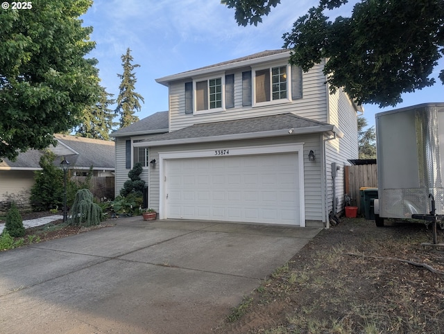 33874 NE Erin Dr, Scappoose, OR 97056 - view of front of home with a garage and concrete driveway