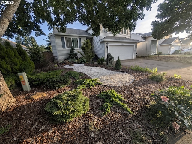 33874 NE Erin Dr, Scappoose, OR 97056 - view of front of home with an attached garage and concrete driveway