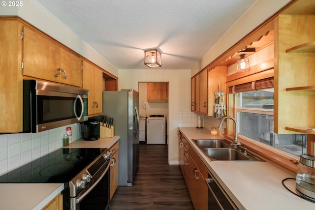 40325 Upper Calapooia Dr, Sweet Home, OR 97386 - kitchen featuring appliances with stainless steel finishes, dark wood-style flooring, backsplash, light countertops, and a textured ceiling