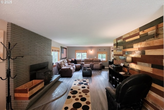 40325 Upper Calapooia Dr, Sweet Home, OR 97386 - living area with wood finished floors, a textured ceiling, and wood walls