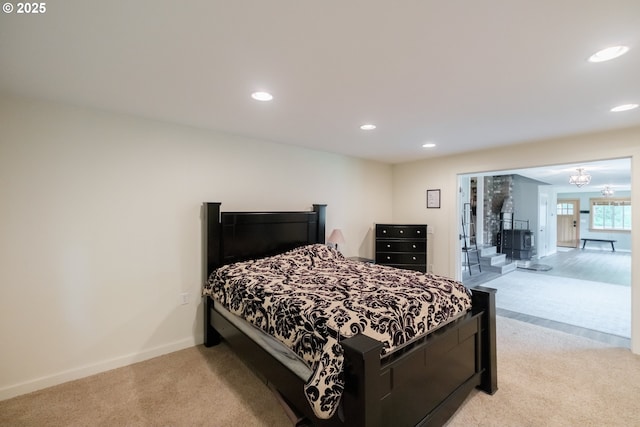 40325 Upper Calapooia Dr, Sweet Home, OR 97386 - bedroom featuring light carpet, recessed lighting, a chandelier, and access to outside