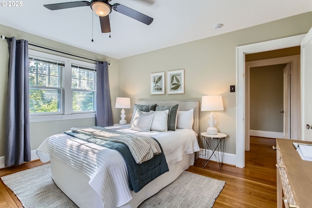 5536 N Delaware Ave, Portland, OR 97217 - bedroom featuring light wood-style floors, baseboards, and ceiling fan