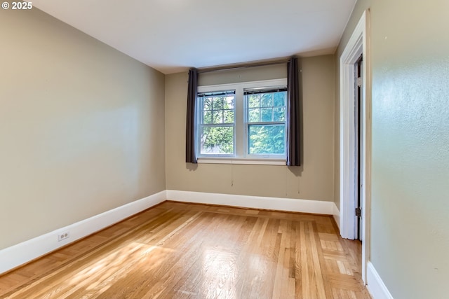5536 N Delaware Ave, Portland, OR 97217 - spare room with baseboards and light wood-type flooring
