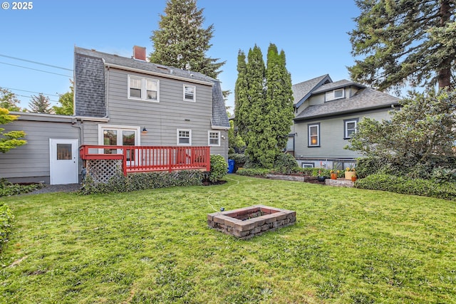 5536 N Delaware Ave, Portland, OR 97217 - rear view of house with a lawn, a chimney, and a deck