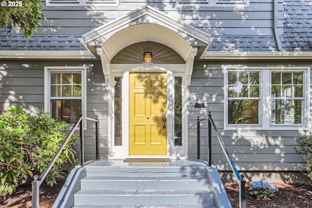 5536 N Delaware Ave, Portland, OR 97217 - property entrance with roof with shingles