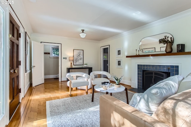 5536 N Delaware Ave, Portland, OR 97217 - living area with ornamental molding, baseboards, and a fireplace