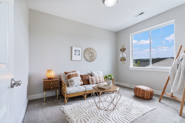 carpeted bedroom with baseboards
