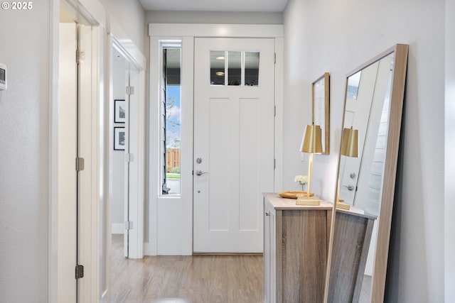 entrance foyer featuring light wood-style flooring