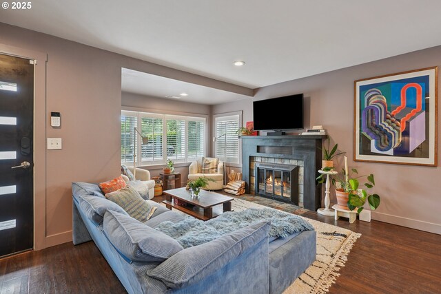 7913 SE Henderson St, Portland, OR 97206 - living area with wood finished floors, a tiled fireplace, and recessed lighting