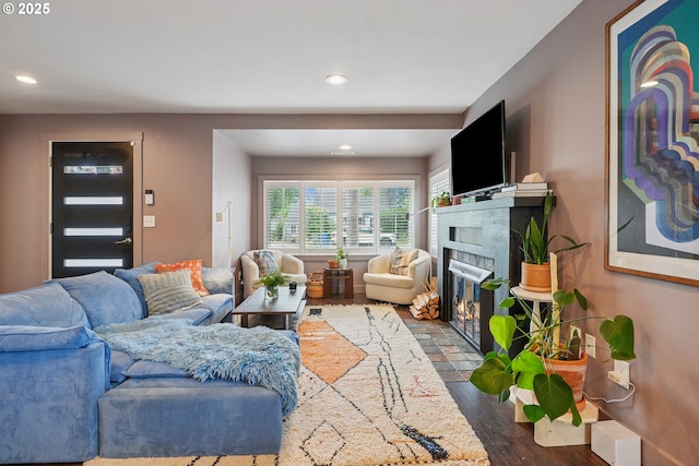 7913 SE Henderson St, Portland, OR 97206 - living room featuring recessed lighting, a tiled fireplace, and wood finished floors