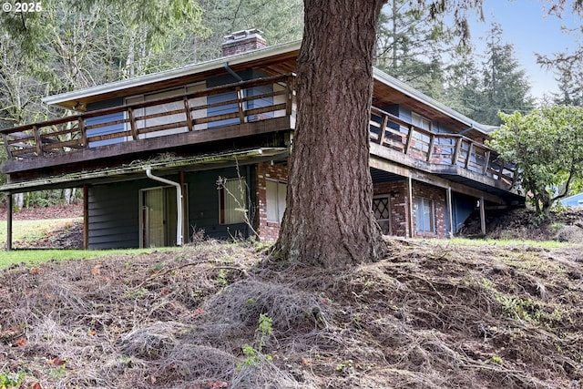 rear view of house with a deck