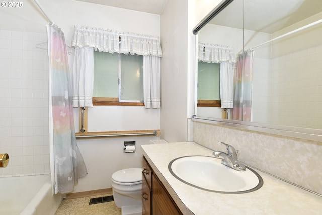 full bathroom featuring vanity, toilet, and shower / bath combo with shower curtain