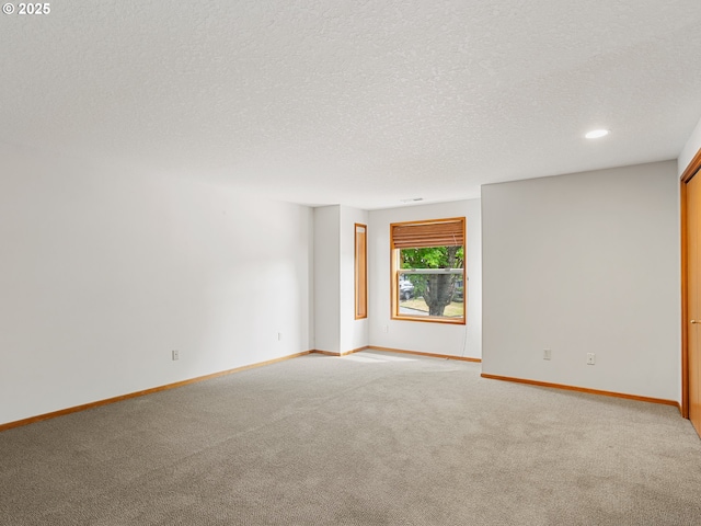 15917 NE Union Rd Unit 103, Ridgefield, WA 98642 - spare room with carpet, a textured ceiling, and recessed lighting
