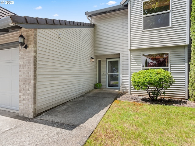 15917 NE Union Rd Unit 103, Ridgefield, WA 98642 - view of exterior entry with a garage