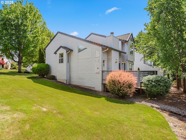 15917 NE Union Rd Unit 103, Ridgefield, WA 98642 - view of property exterior with a chimney and a yard