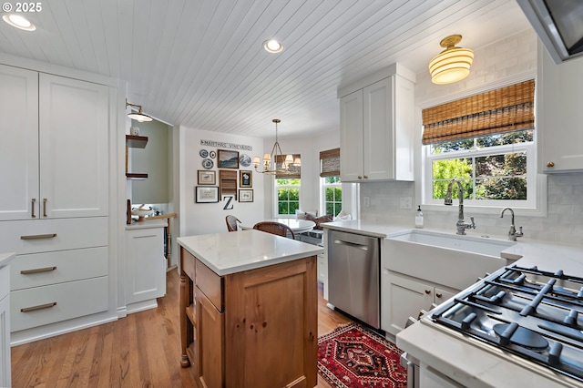 20525 Martin Ct, West Linn, OR 97068 - kitchen with dishwasher, recessed lighting, wood ceiling, light wood-style floors, and tasteful backsplash