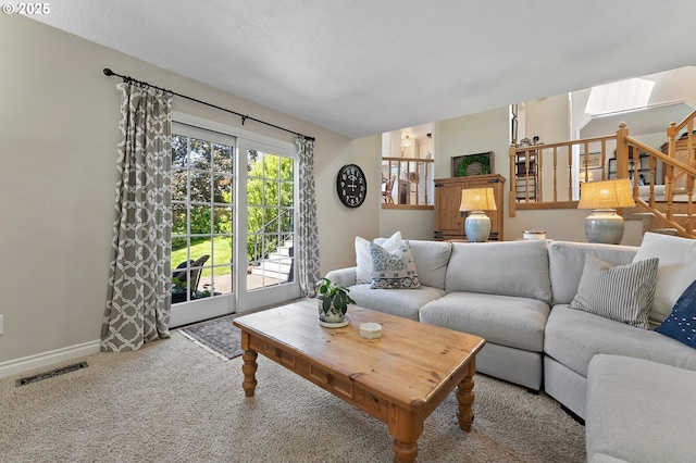 20525 Martin Ct, West Linn, OR 97068 - carpeted living room featuring a skylight and stairs