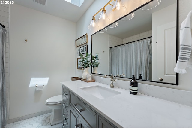 20525 Martin Ct, West Linn, OR 97068 - bathroom featuring vanity, a skylight, a shower with shower curtain, and tile patterned floors