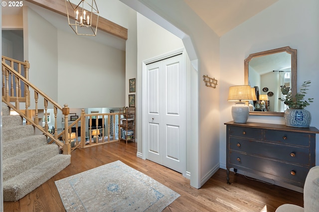20525 Martin Ct, West Linn, OR 97068 - foyer entrance with a chandelier, wood finished floors, and a high ceiling