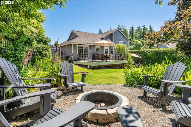 20525 Martin Ct, West Linn, OR 97068 - rear view of house with a fire pit, a wooden deck, and a yard