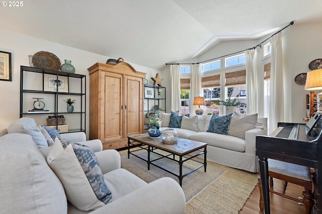 20525 Martin Ct, West Linn, OR 97068 - living area with light wood-style floors and vaulted ceiling