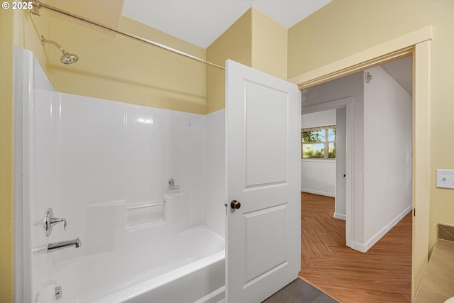 630 NE Adwick Dr, Hillsboro, OR 97006 - full bath featuring shower / washtub combination, parquet floors, and baseboards