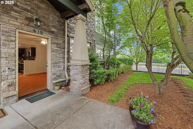 630 NE Adwick Dr, Hillsboro, OR 97006 - doorway to property featuring stone siding