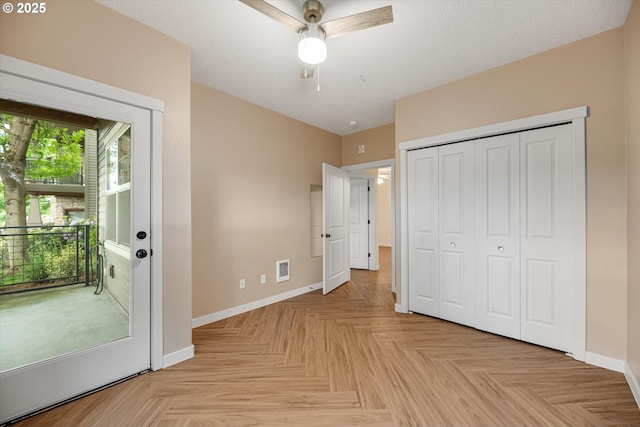 630 NE Adwick Dr, Hillsboro, OR 97006 - unfurnished bedroom featuring baseboards, a closet, and a ceiling fan