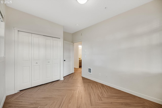 630 NE Adwick Dr, Hillsboro, OR 97006 - unfurnished bedroom with baseboards and a closet