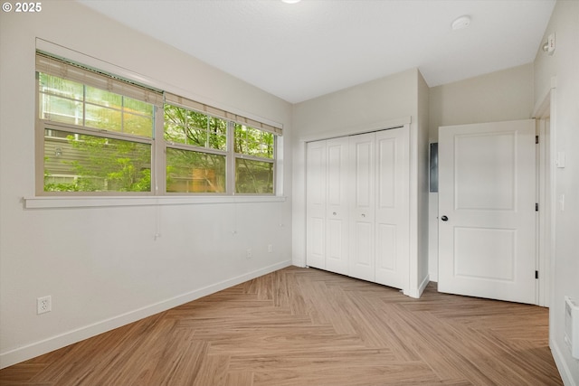 630 NE Adwick Dr, Hillsboro, OR 97006 - unfurnished bedroom with baseboards and a closet